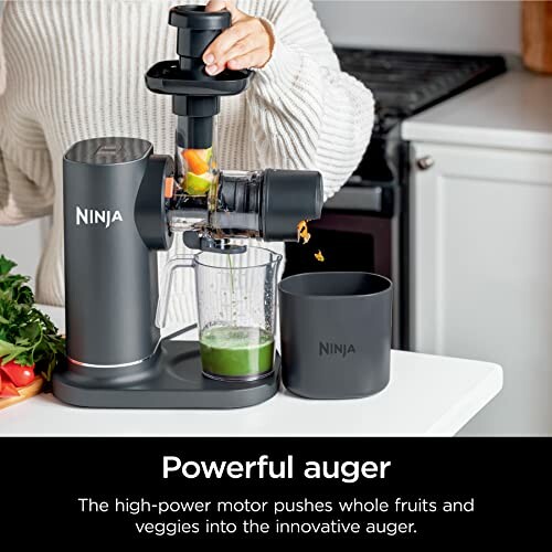 Ninja juicer with powerful auger for whole fruits and veggies.